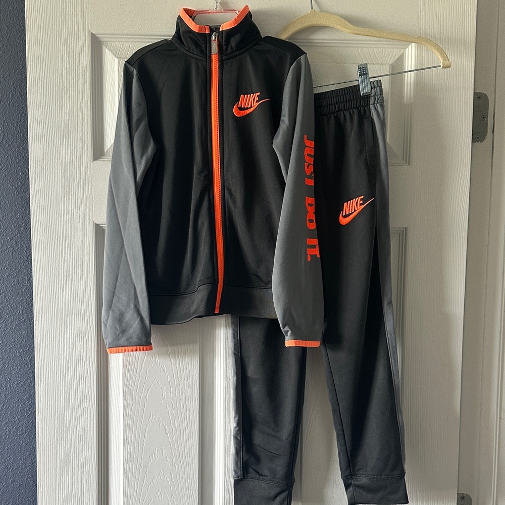 Nike Black and Gray Tracksuit with Bold Orange Details
